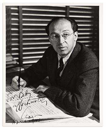 COPLAND, AARON. Two Photographs Signed and Inscribed.